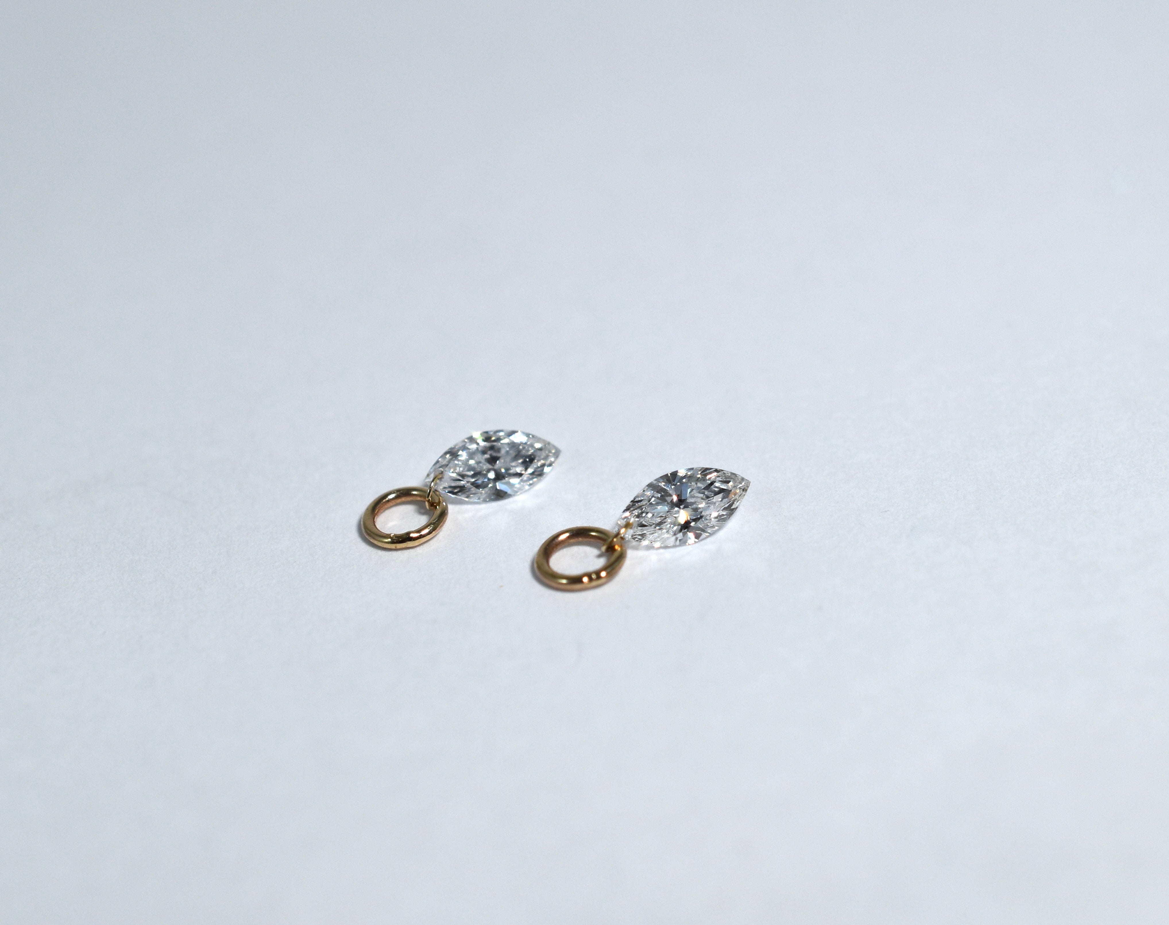 14 karat yellow gold drilled marquise diamond drops