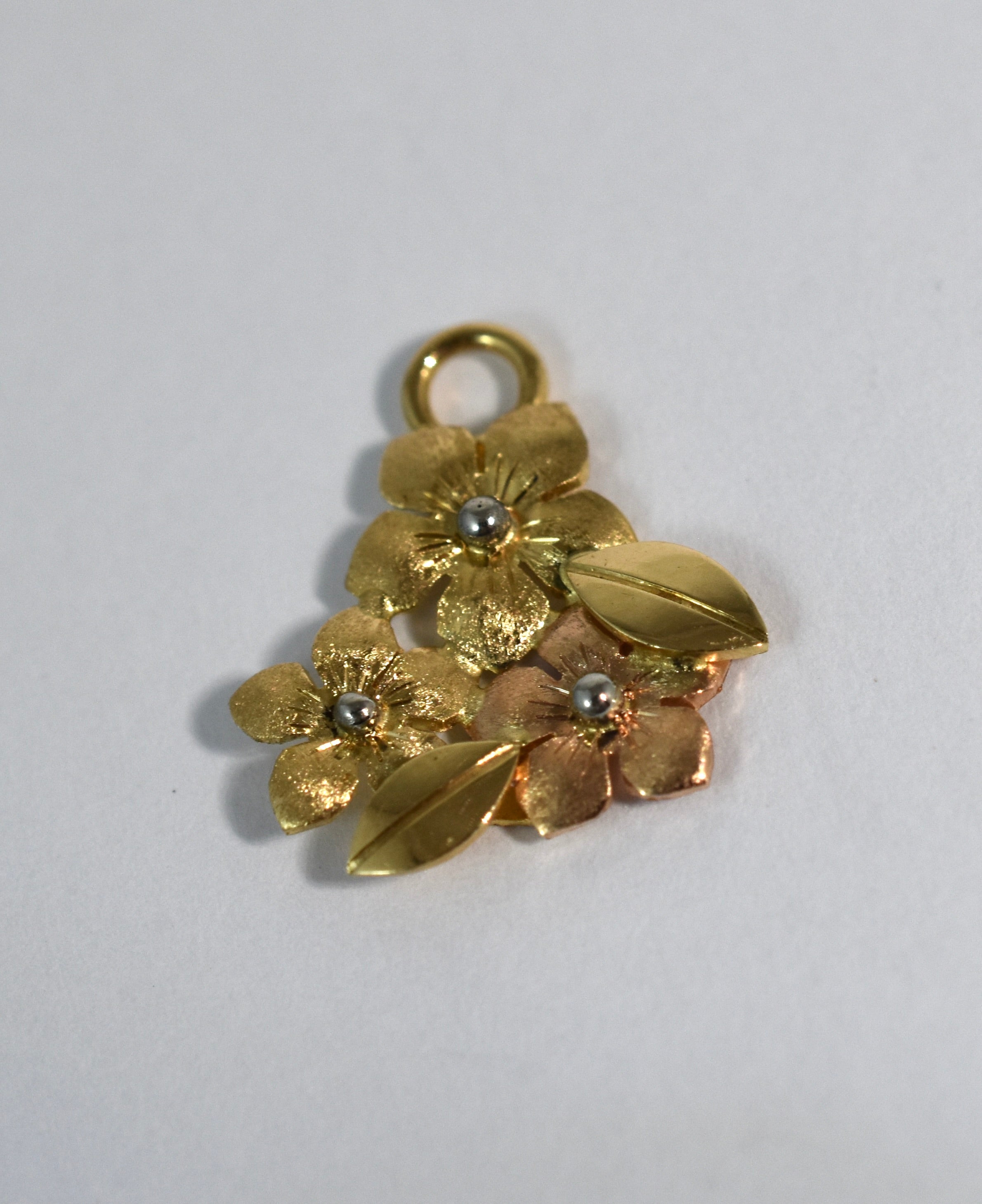 18 karat yellow and red gold forget-me-not drops