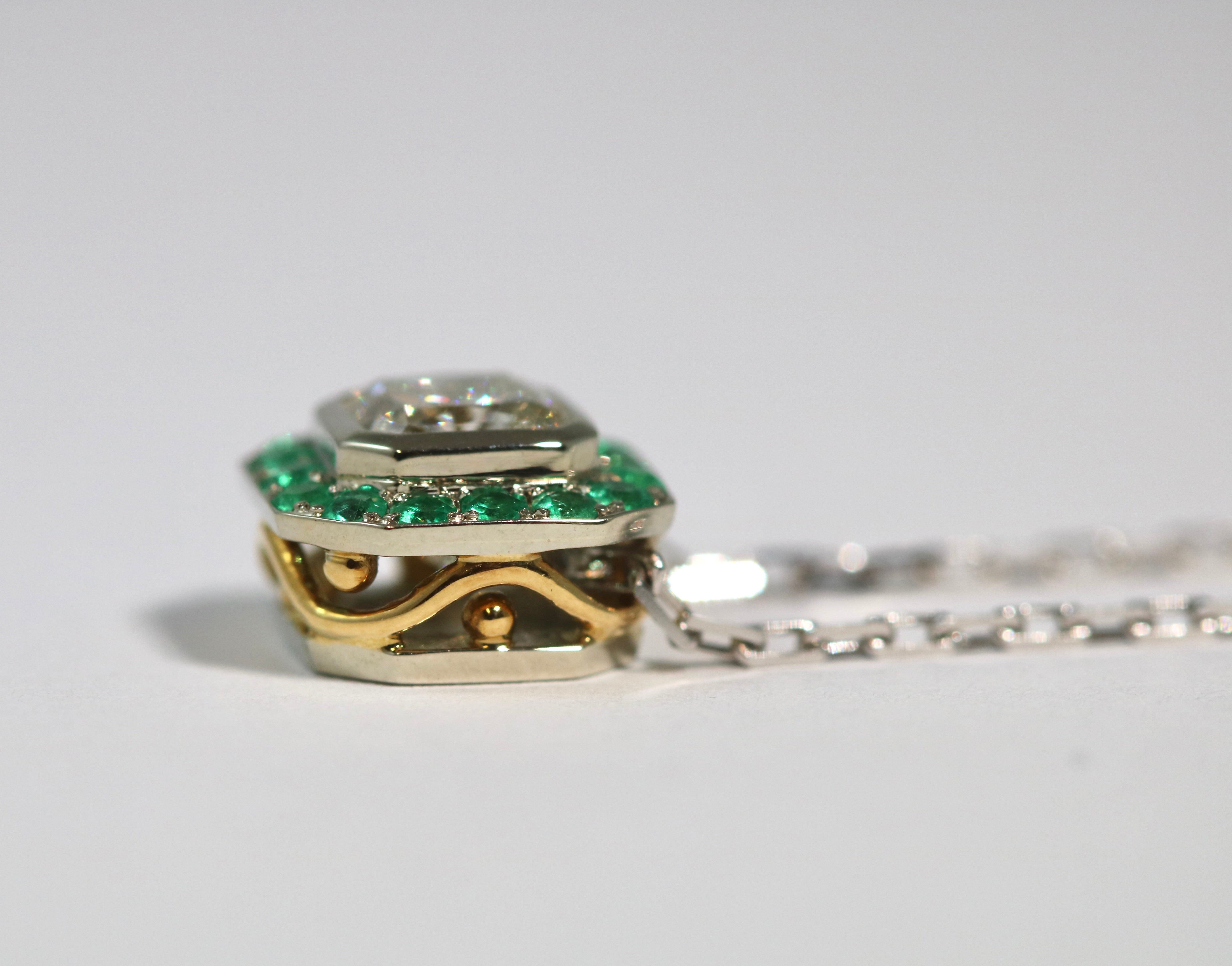 Cut Corner Square Diamond Pendant with Emerald Halo