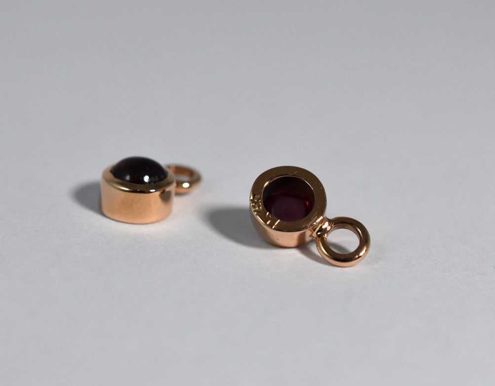 18 karat red gold cabochon garnet drops