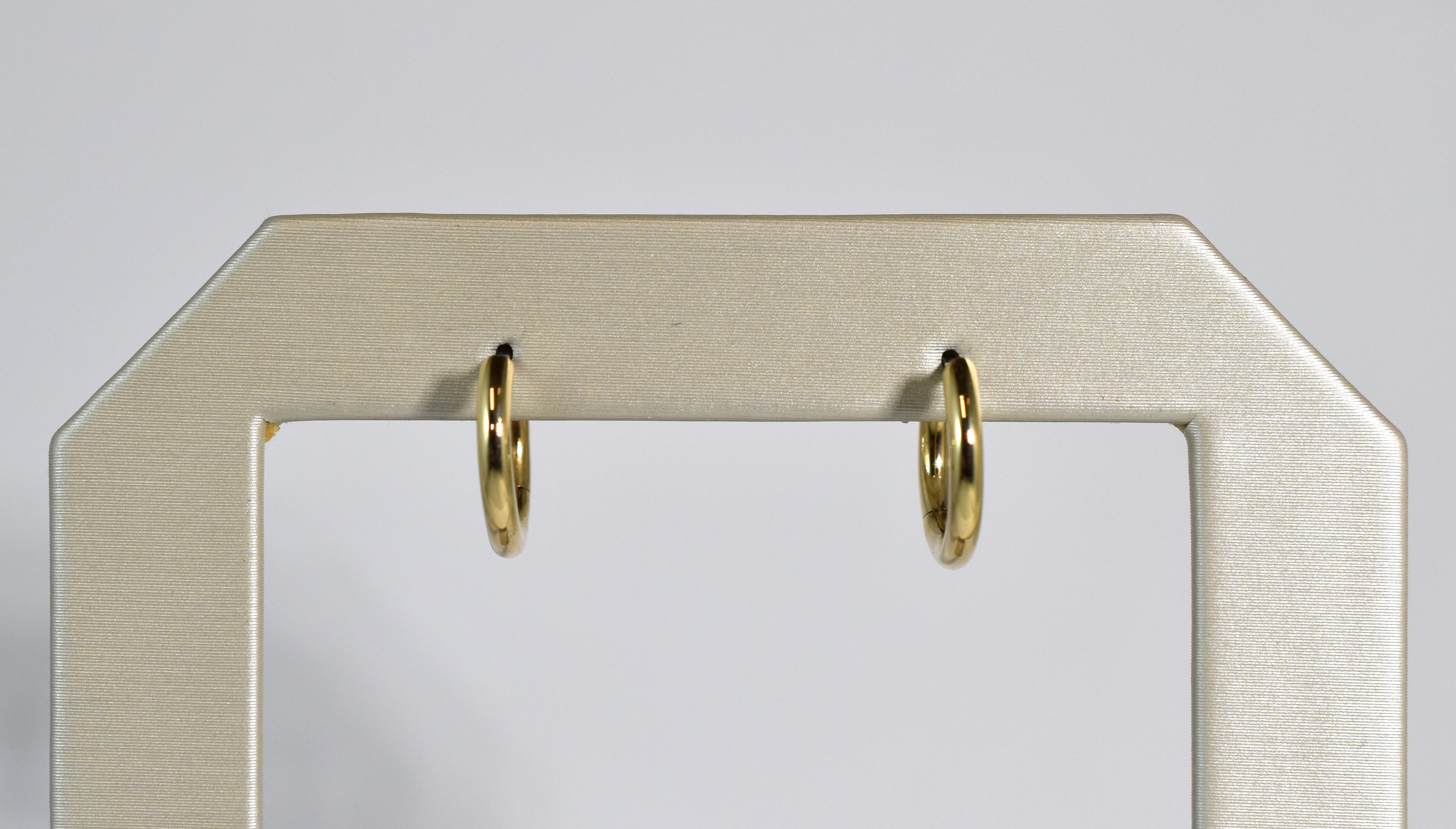 18 karat yellow gold medium locking hoops
