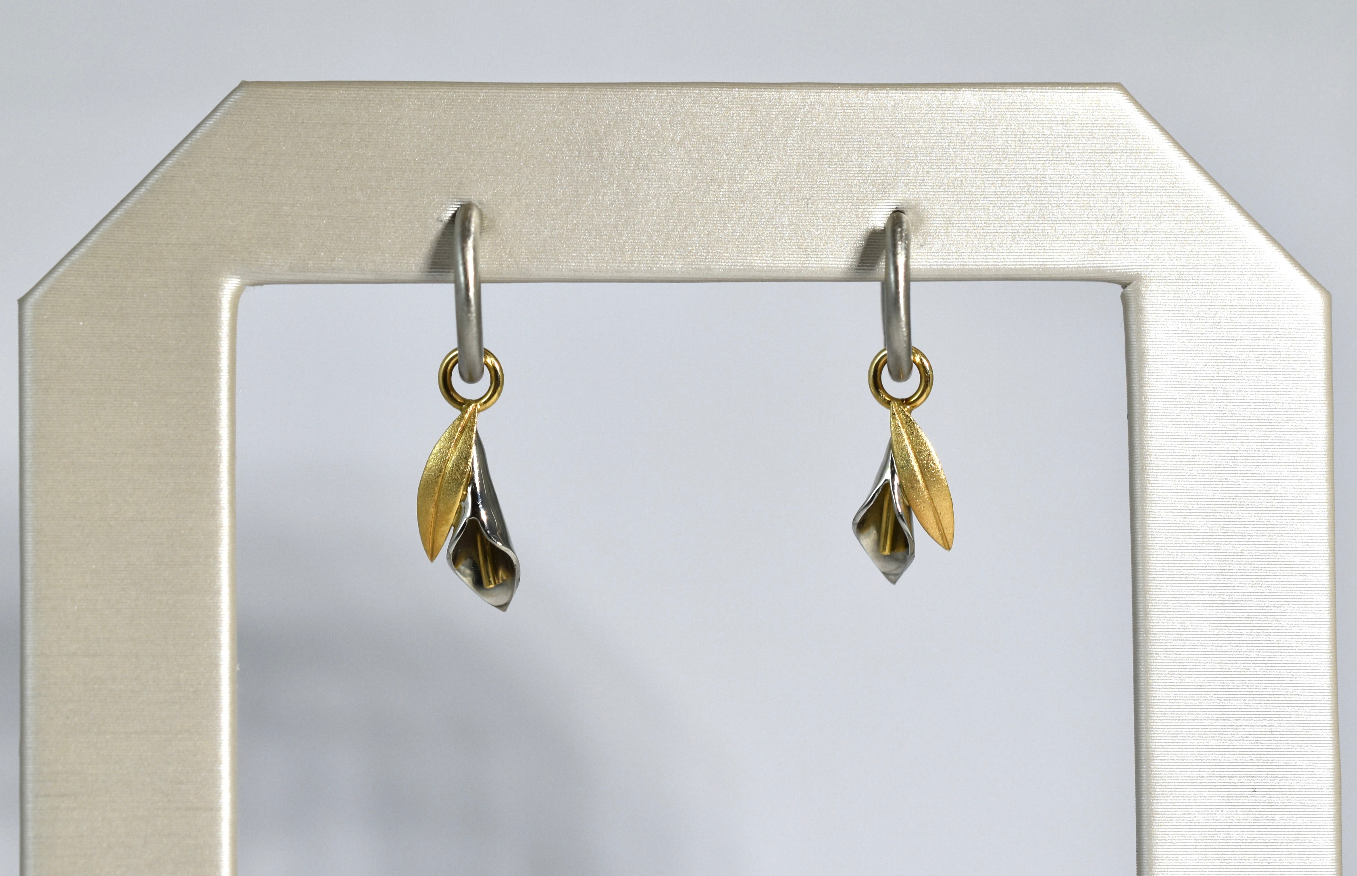 19 karat white gold and 18 karat yellow gold calla lily drops