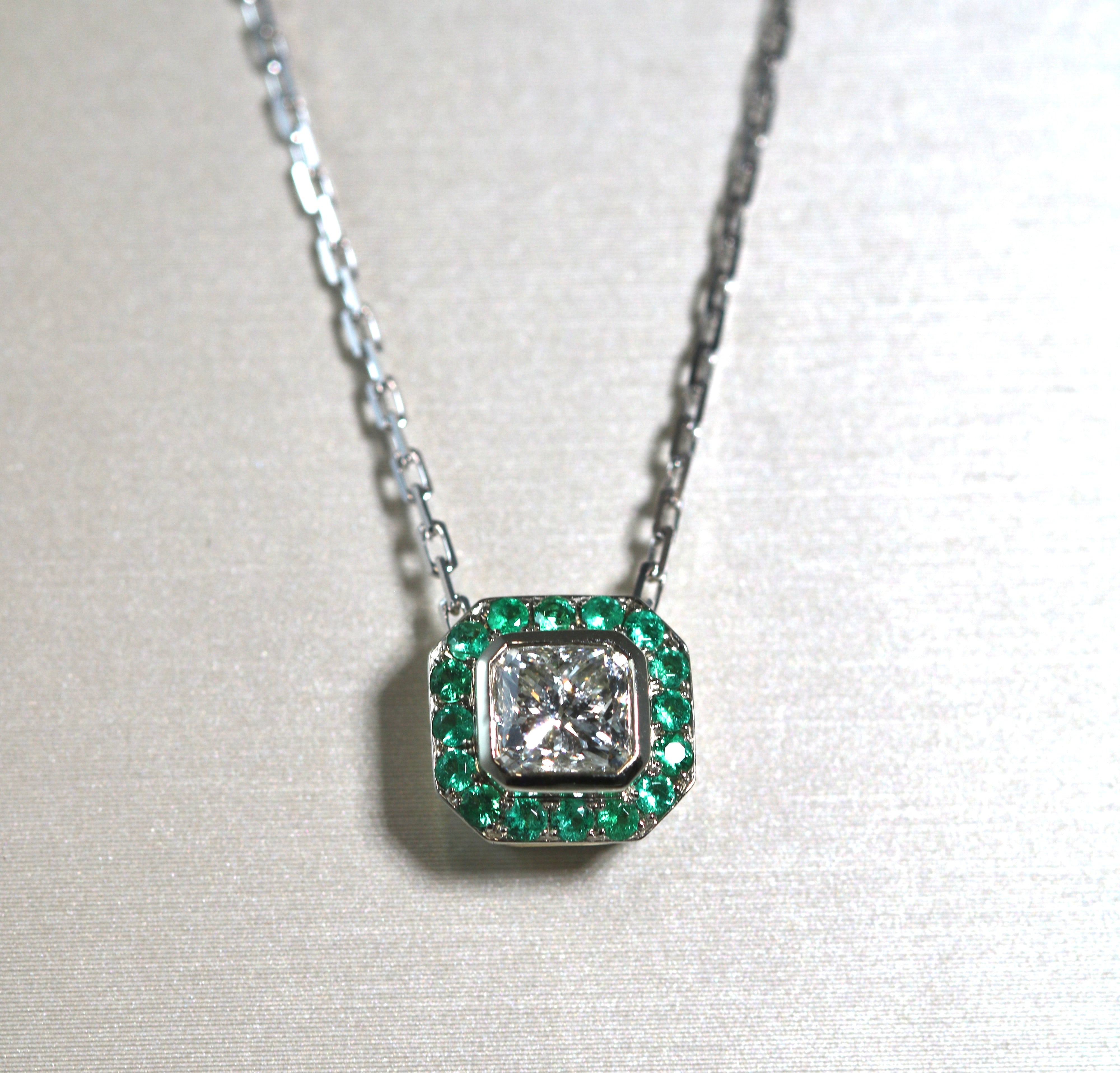 Cut Corner Square Diamond Pendant with Emerald Halo