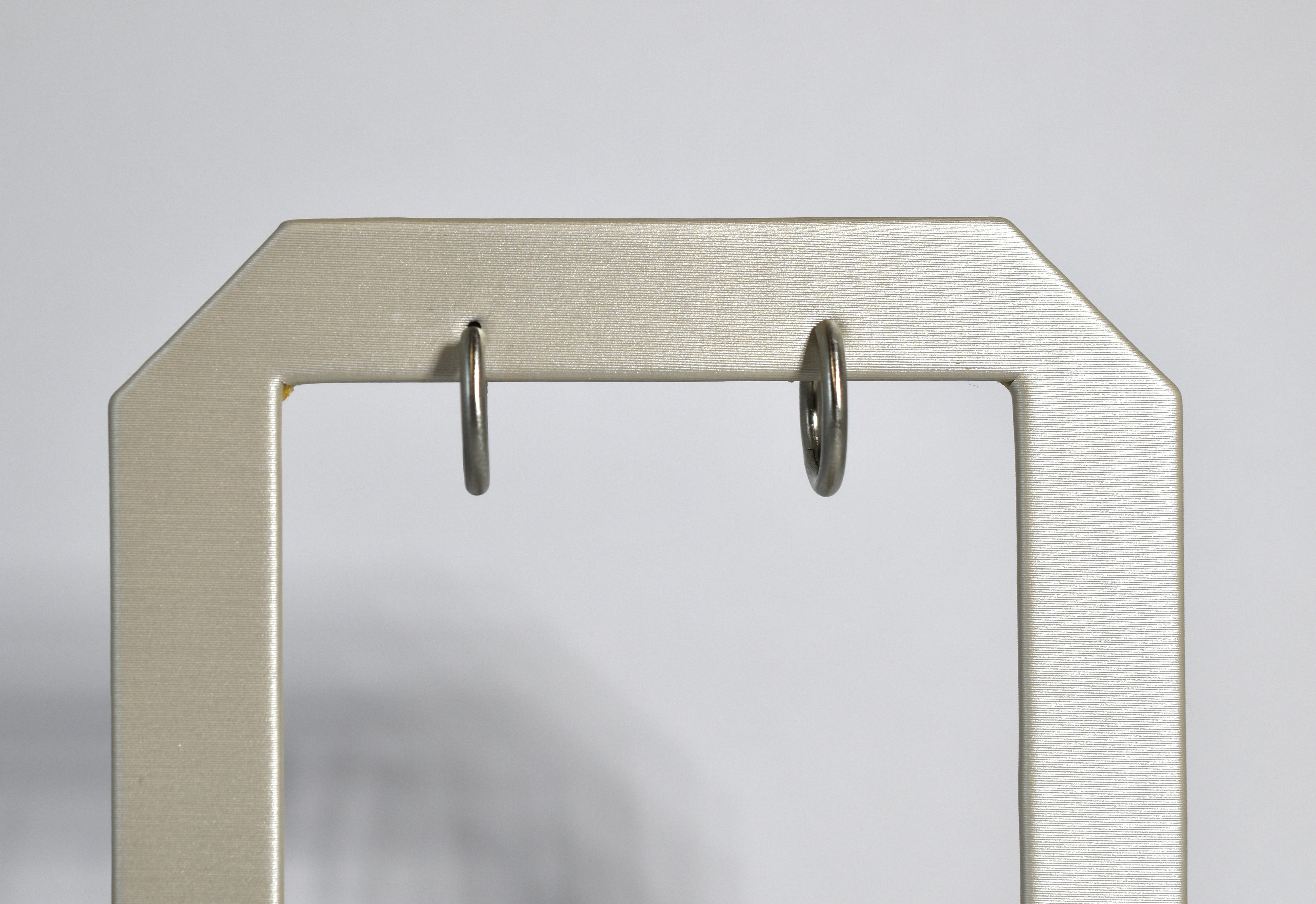 19 karat white brushed gold medium locking hoops