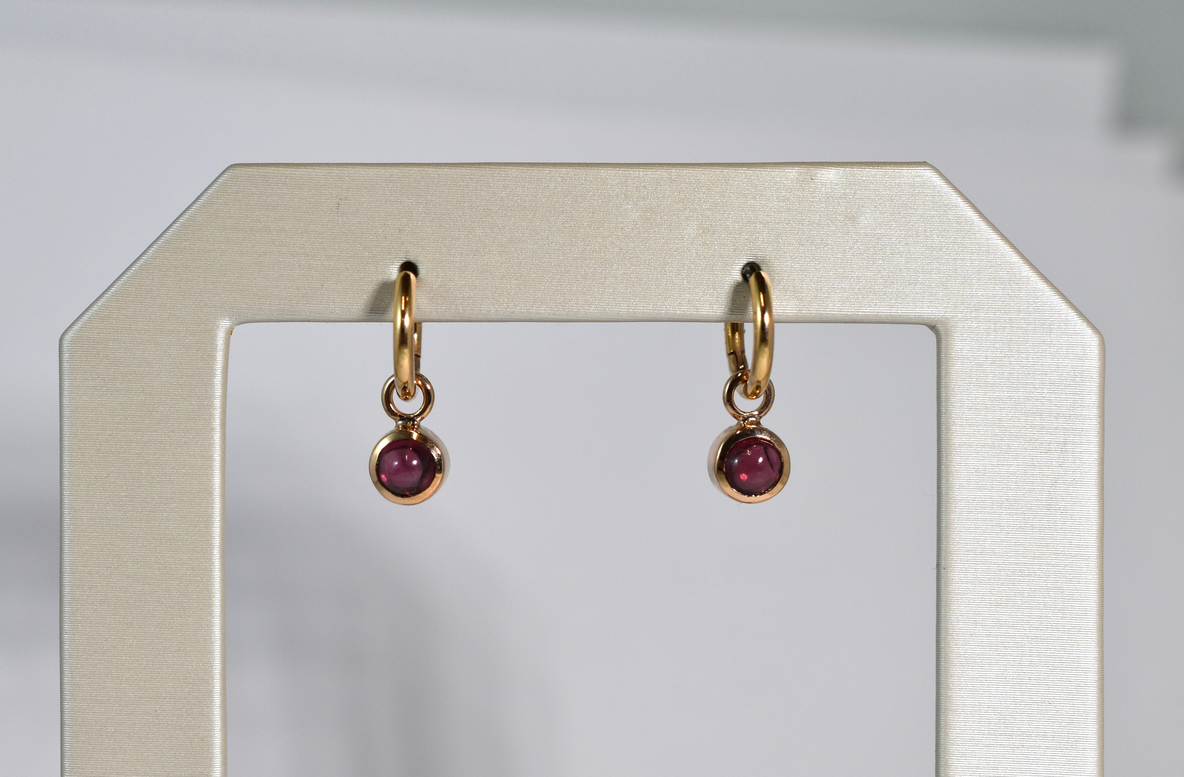 18 karat red gold cabochon garnet drops