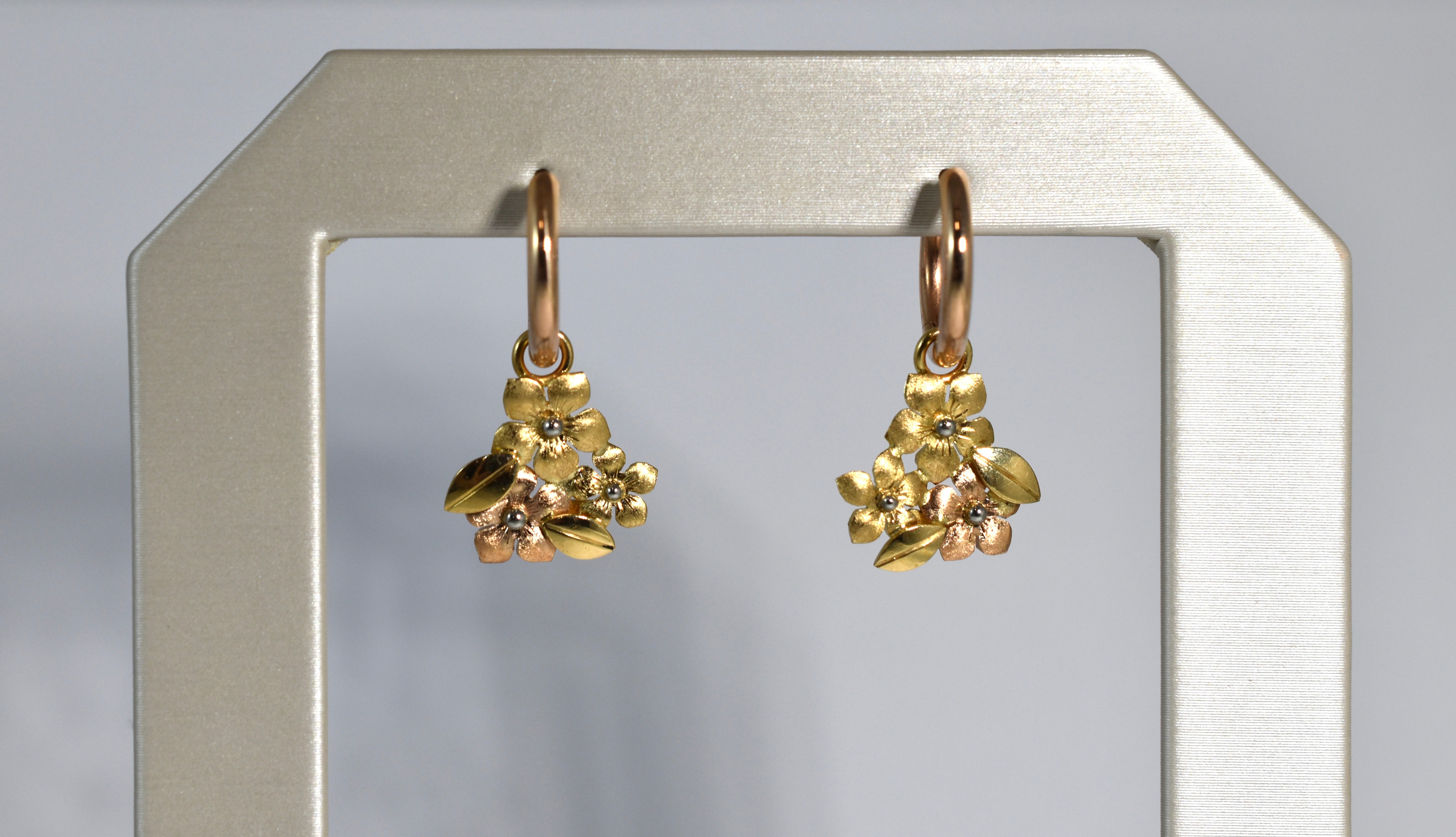 18 karat yellow and red gold forget-me-not drops