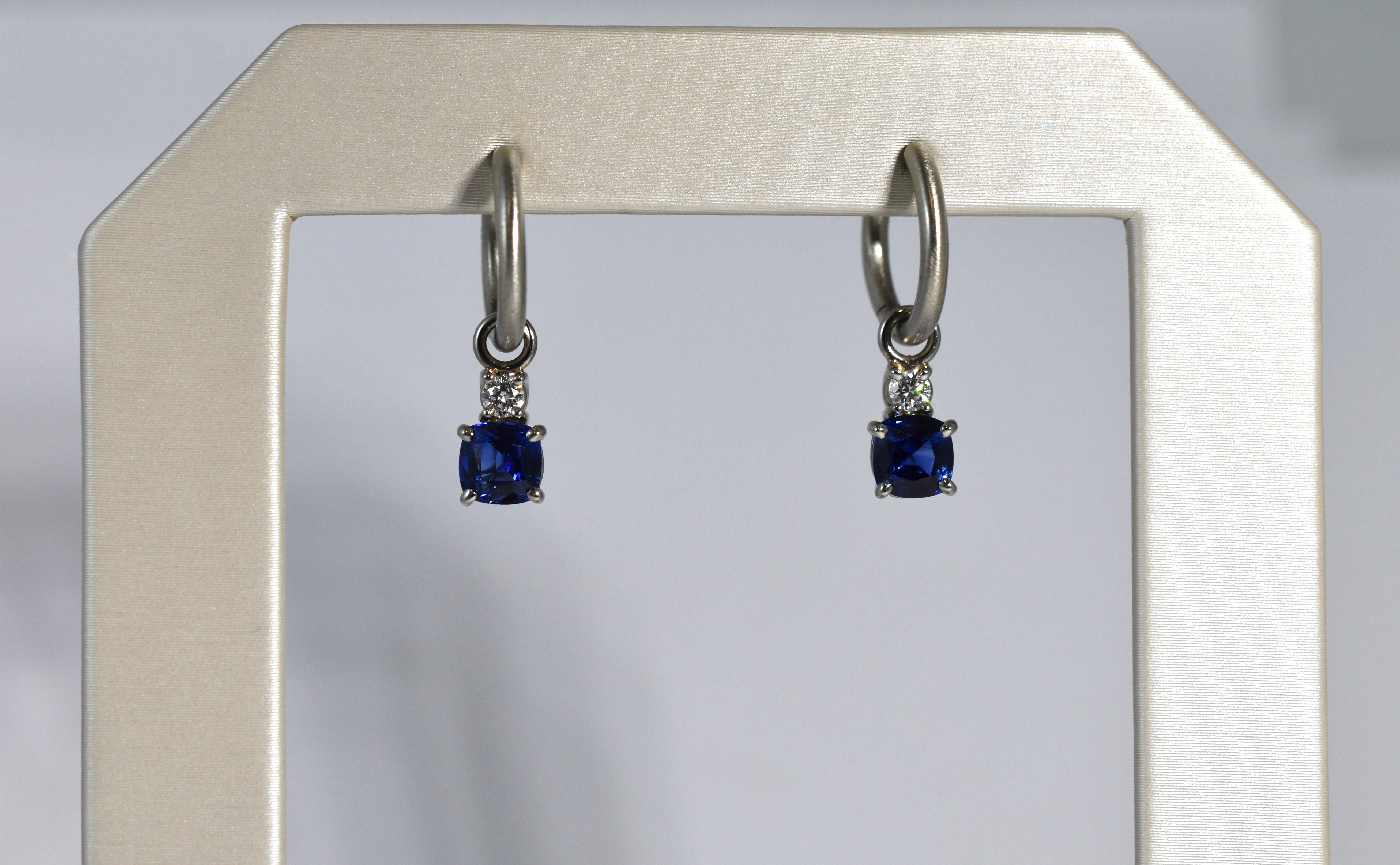 19 karat white gold blue sapphire and diamond drops
