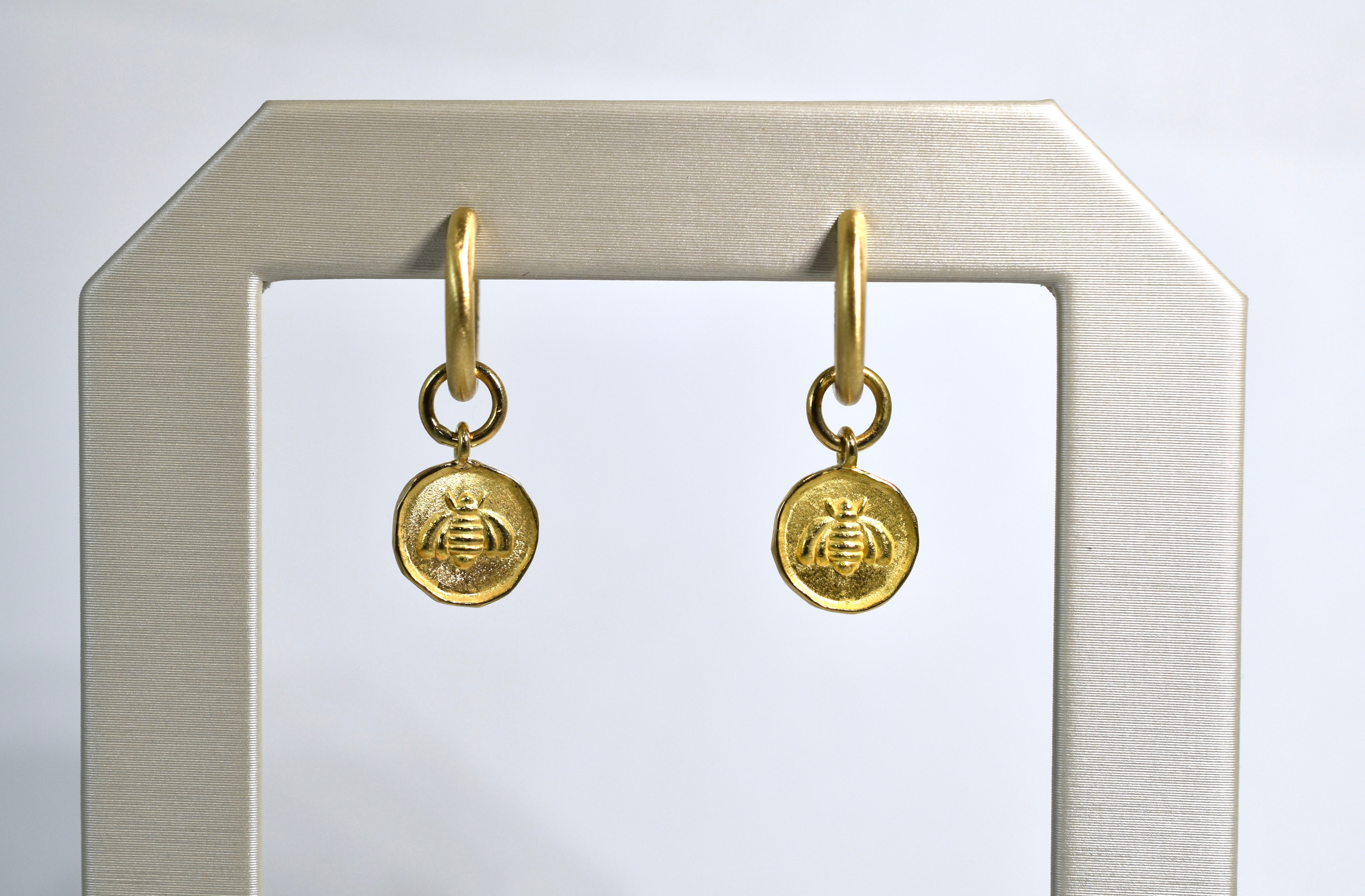 18 karat baby bee disc drops
