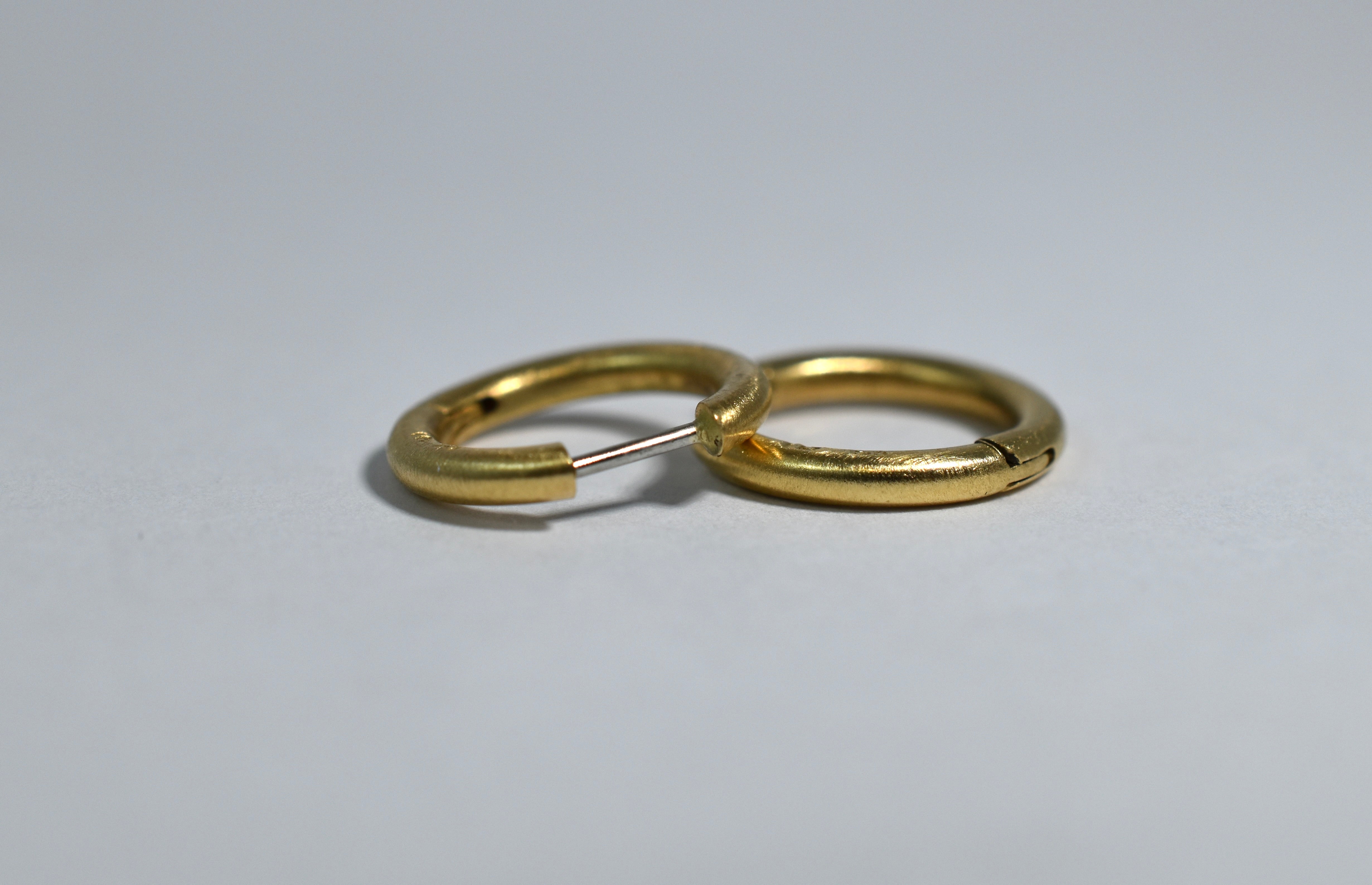 18 karat yellow brushed gold medium locking hoops