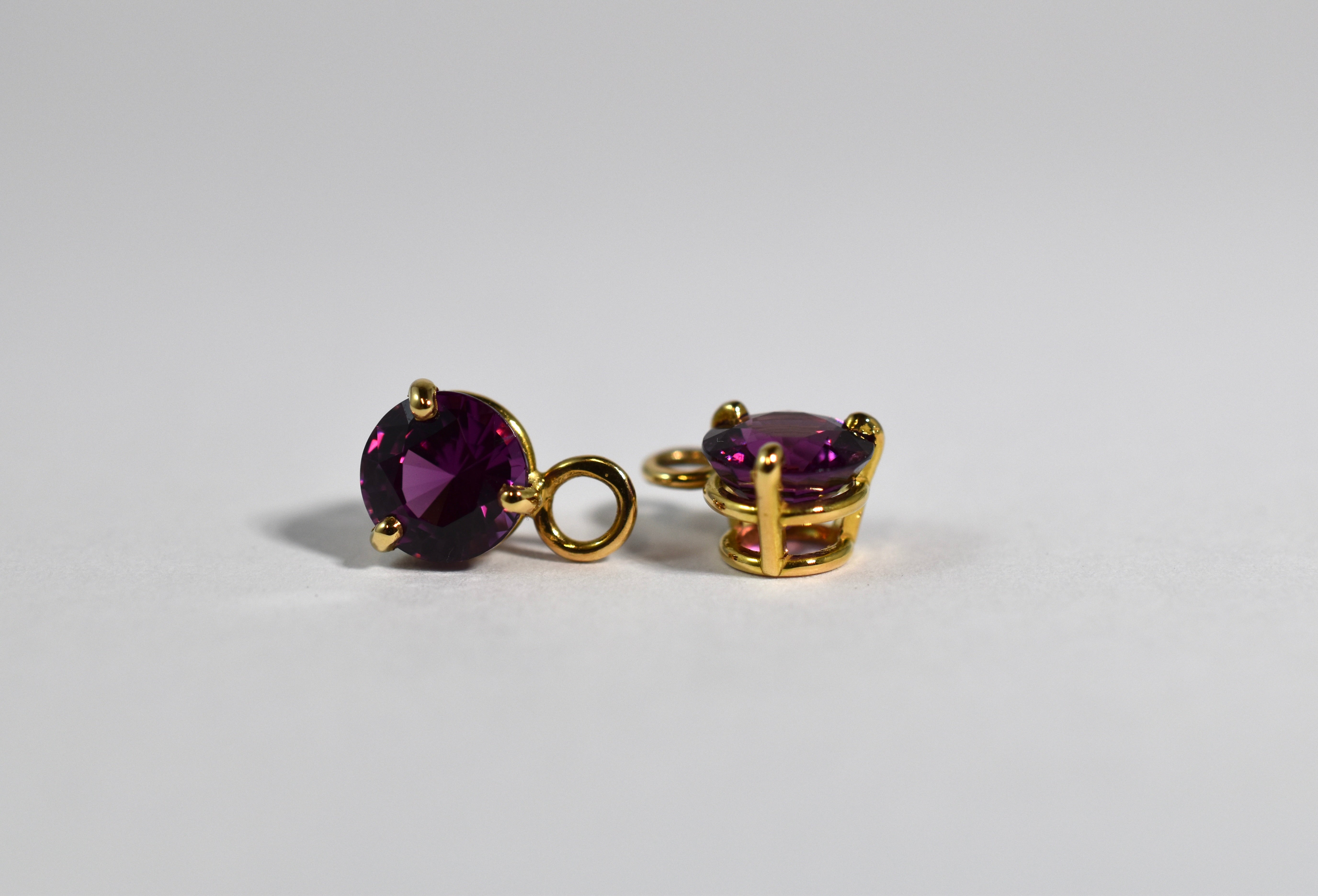 18 karat yellow gold purple garnet drops