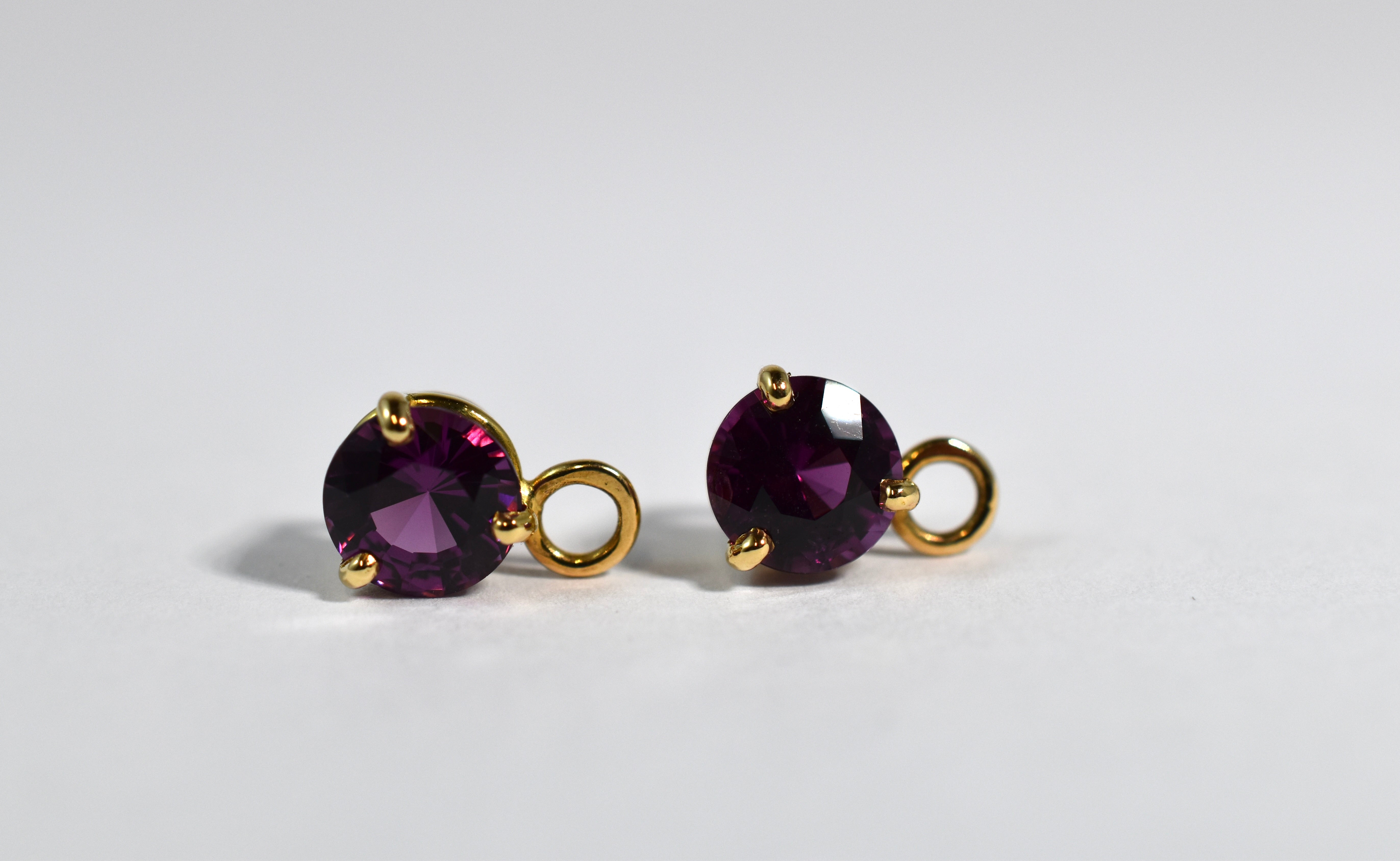 18 karat yellow gold purple garnet drops