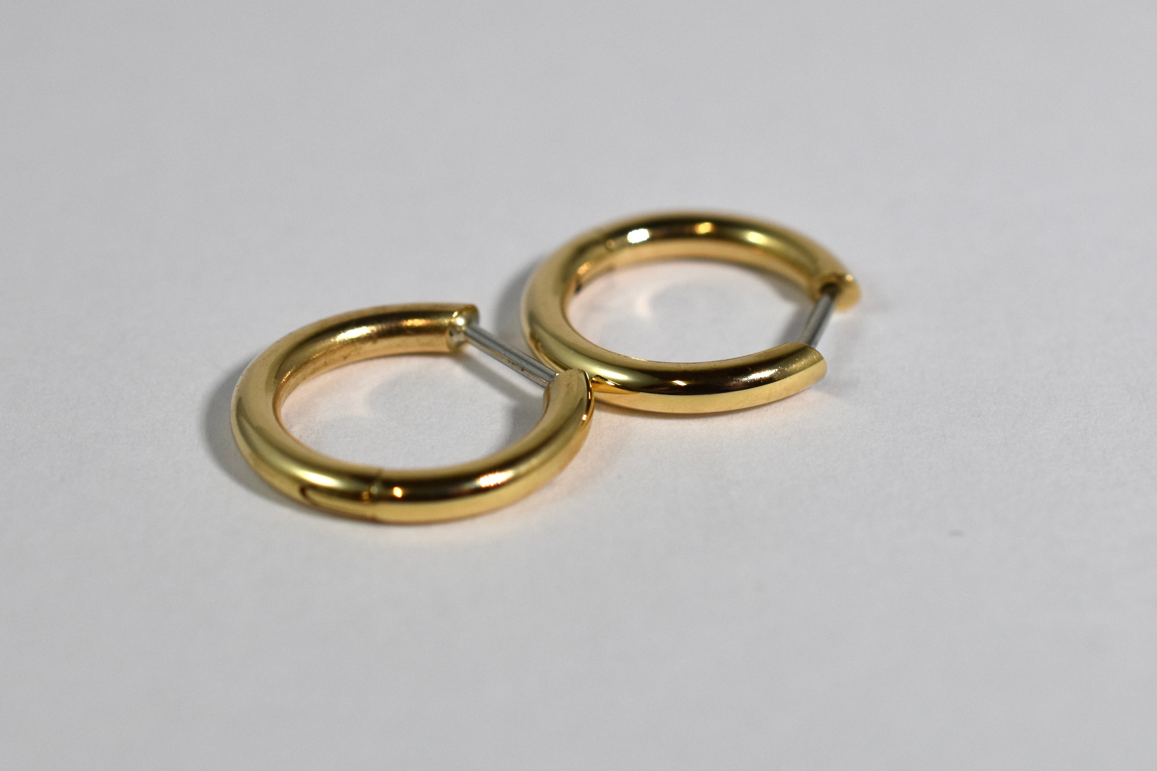 18 karat yellow gold medium locking hoops